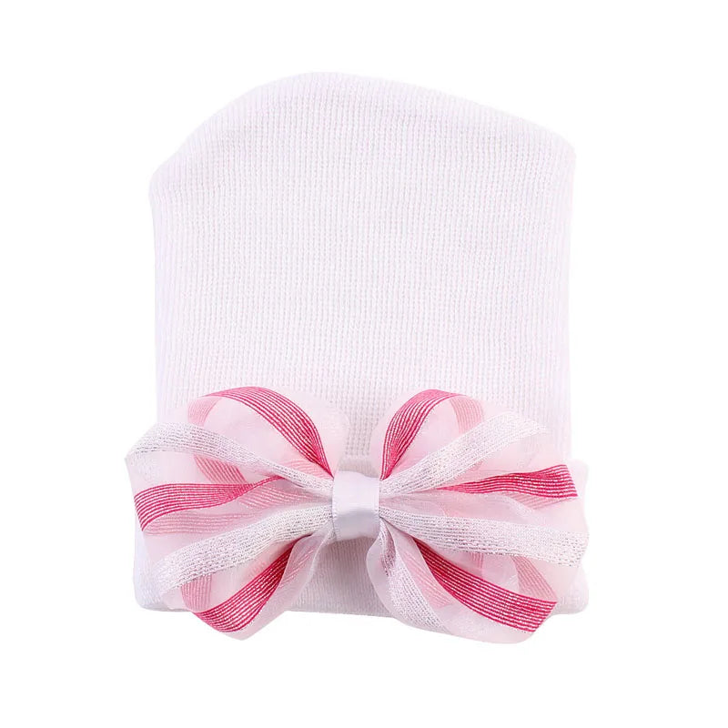 Gorro de algodón con lazo grande para recién nacida