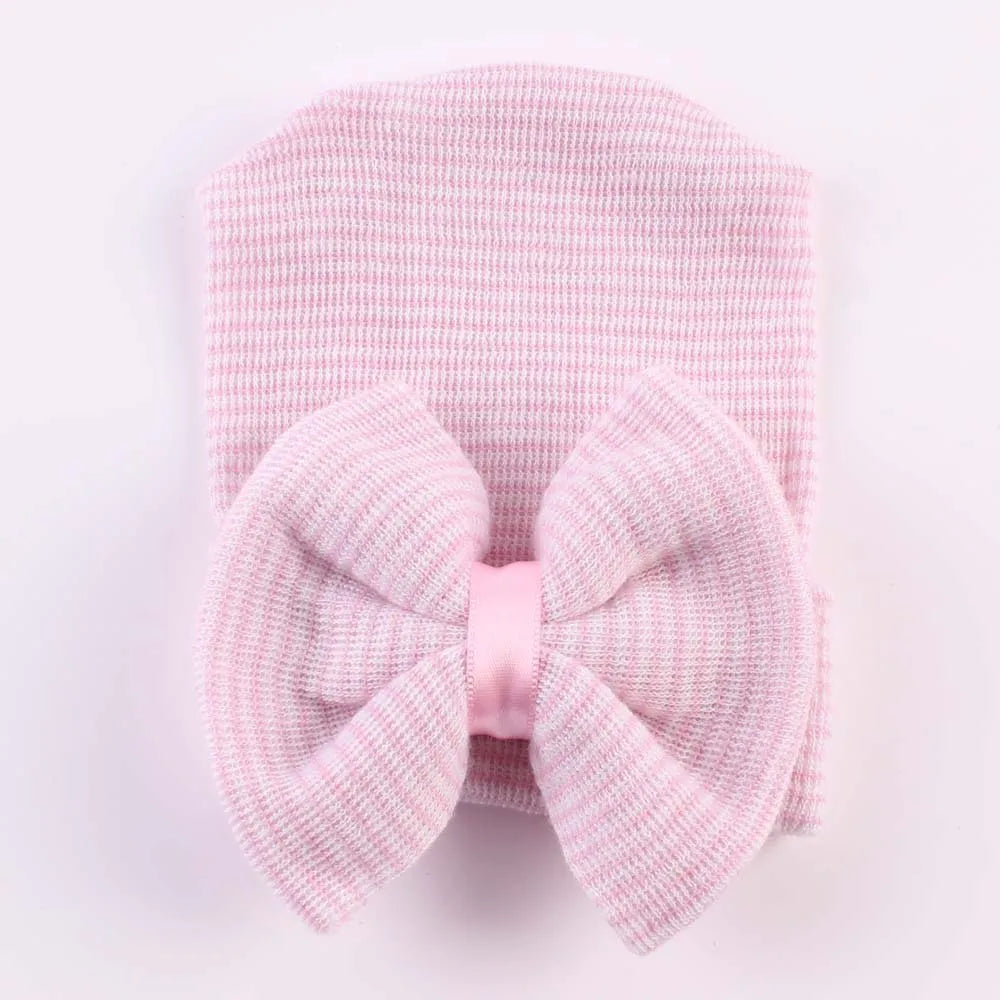 Gorro de algodón con lazo grande para recién nacida