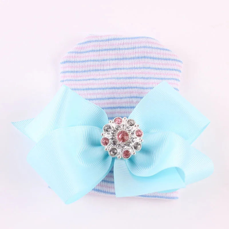 Gorro de algodón con lazo grande para recién nacida