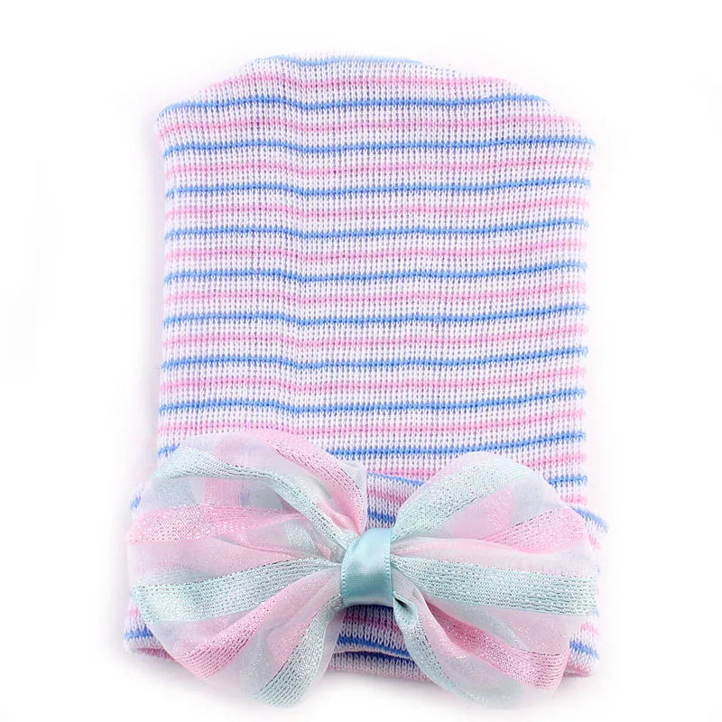 Gorro de algodón con lazo grande para recién nacida