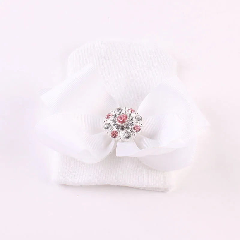 Gorro de algodón con lazo grande para recién nacida