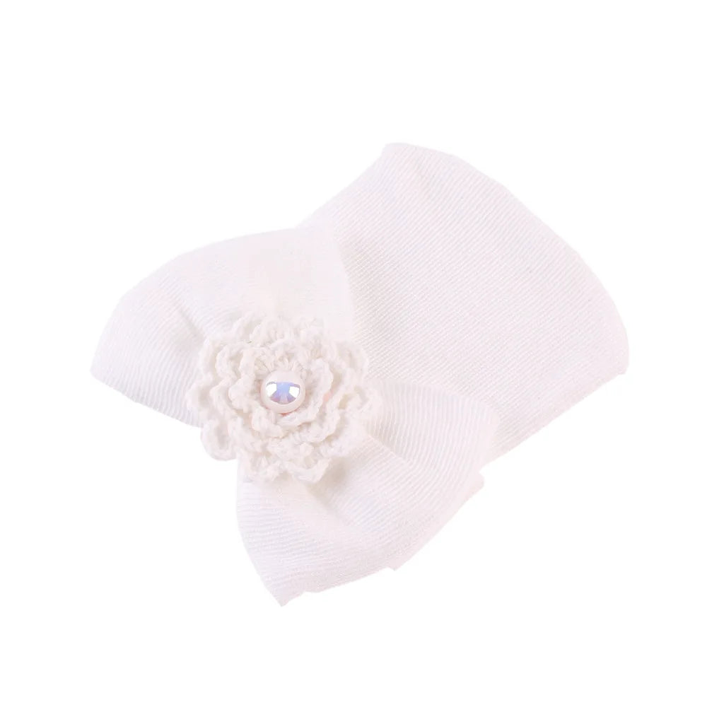 Gorro de algodón con lazo grande para recién nacida