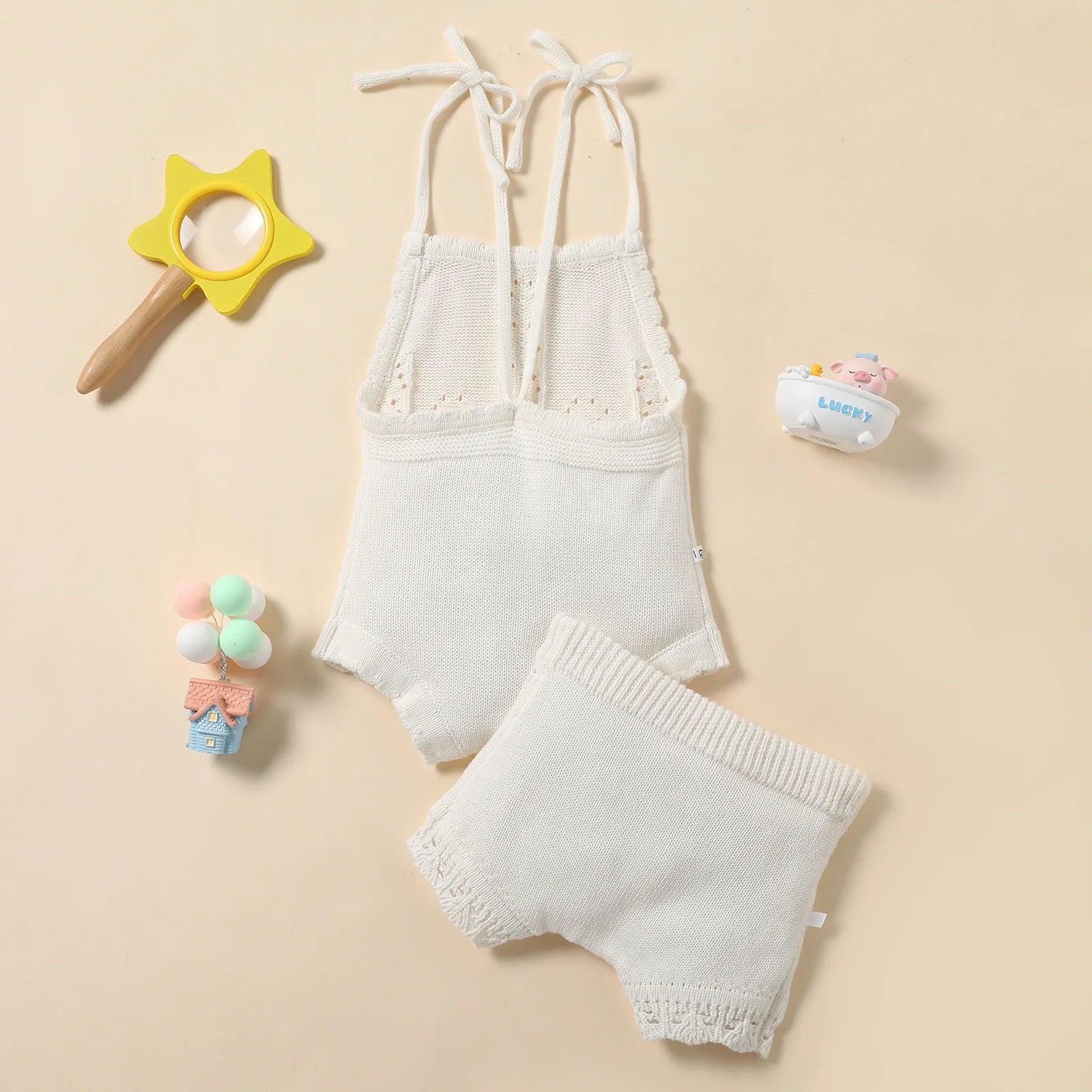 Conjunto de punto con volantes para bebé
