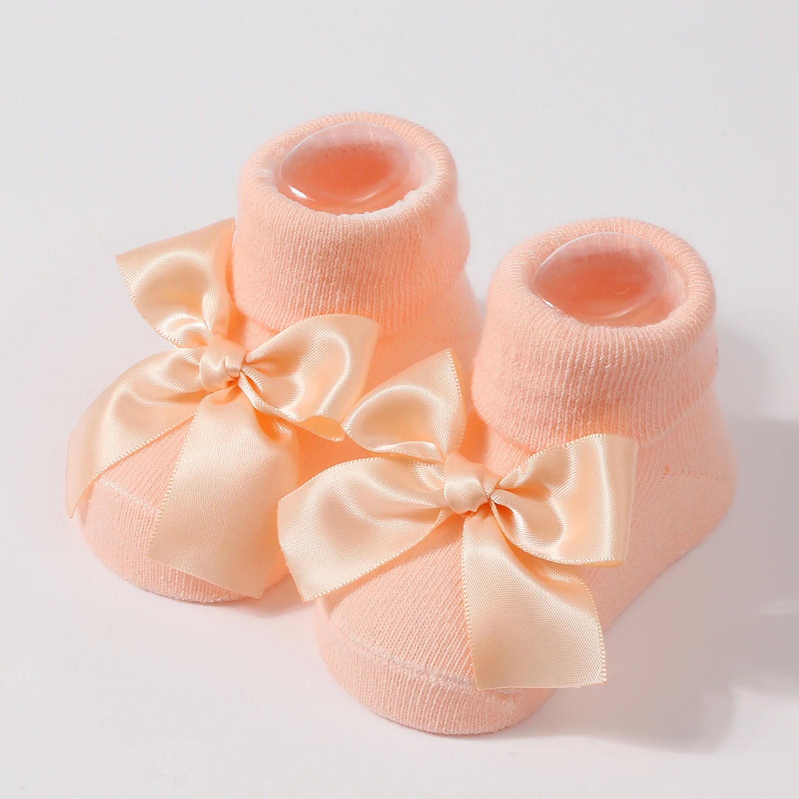 Chaussettes pour bébé en tricot avec nœud