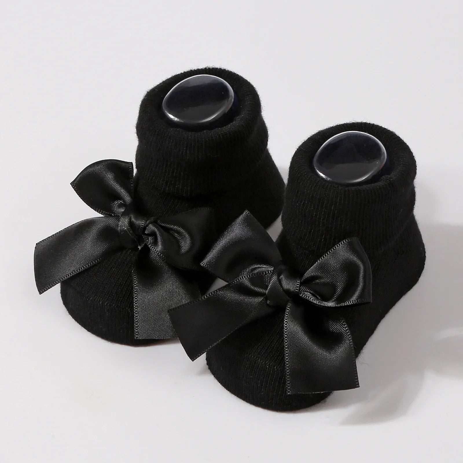 Chaussettes pour bébé en tricot avec nœud