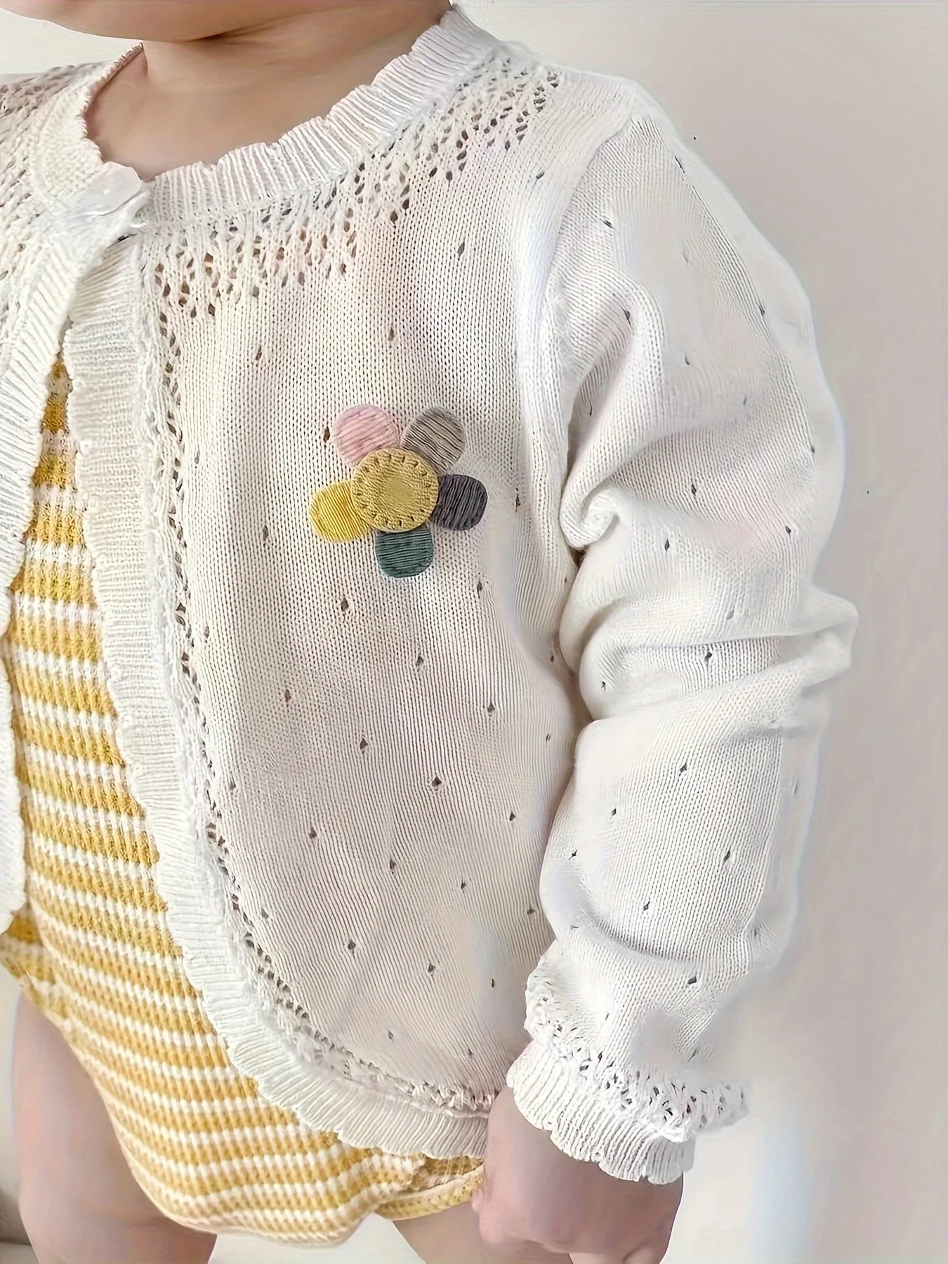 Gilet tricoté pour bébé fille