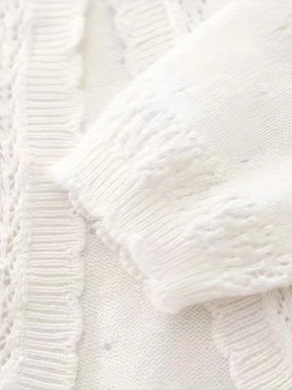Gilet tricoté pour bébé fille