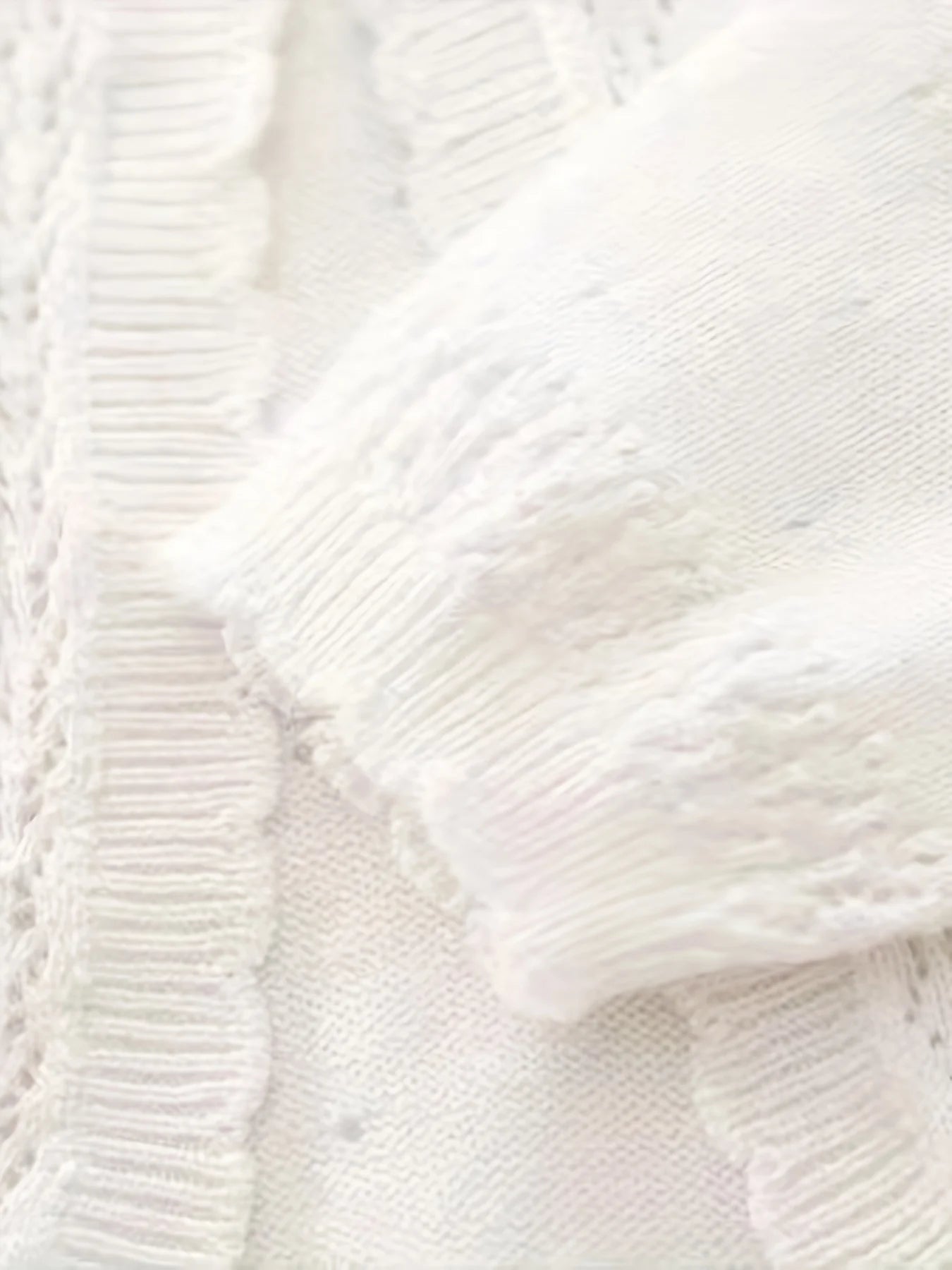 Gilet tricoté pour bébé fille