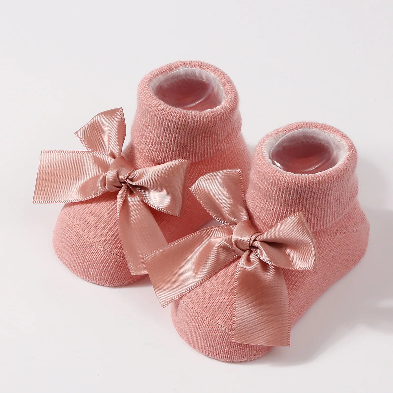 Chaussettes pour bébé en tricot avec nœud
