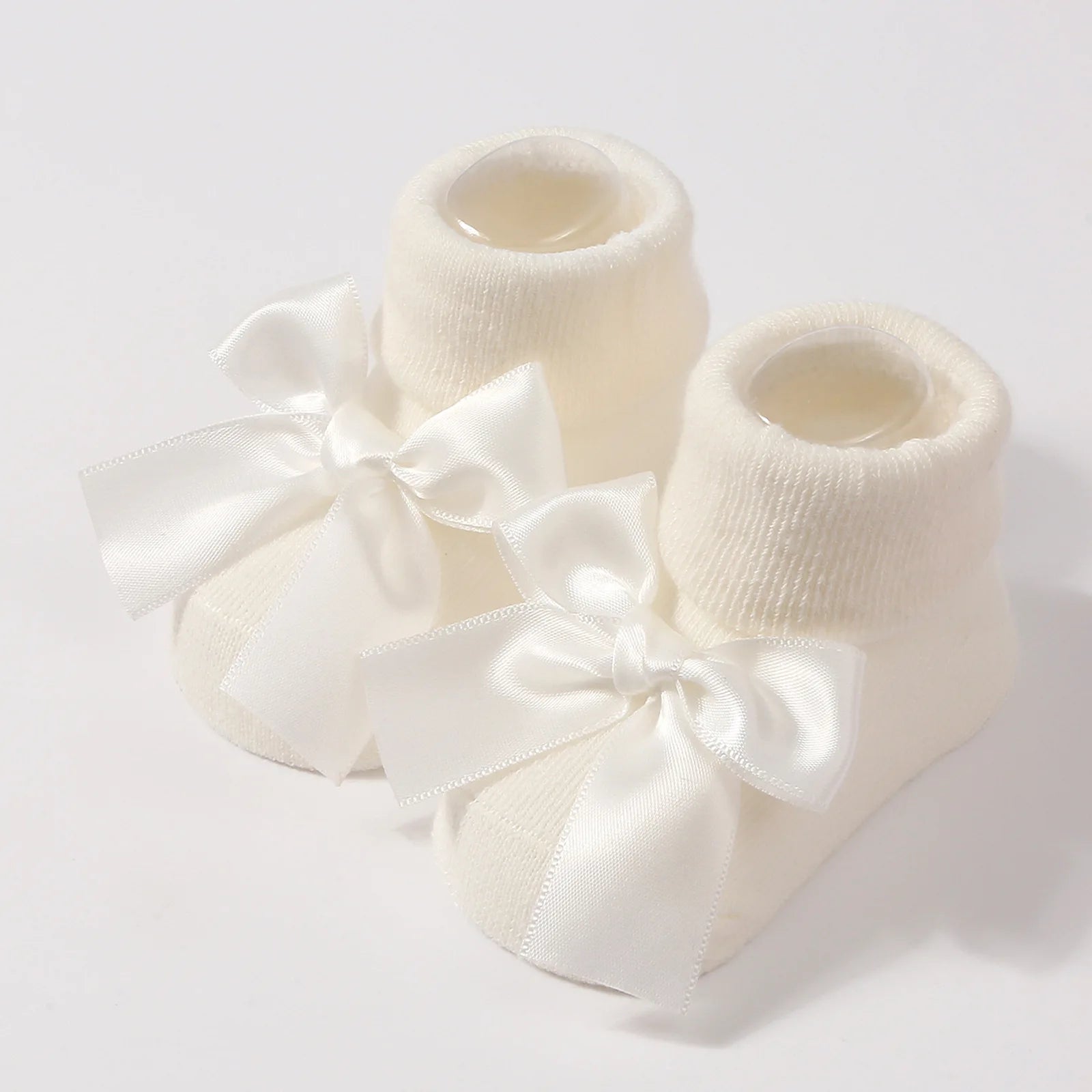 Chaussettes pour bébé en tricot avec nœud