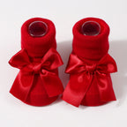 Chaussettes pour bébé en tricot avec nœud