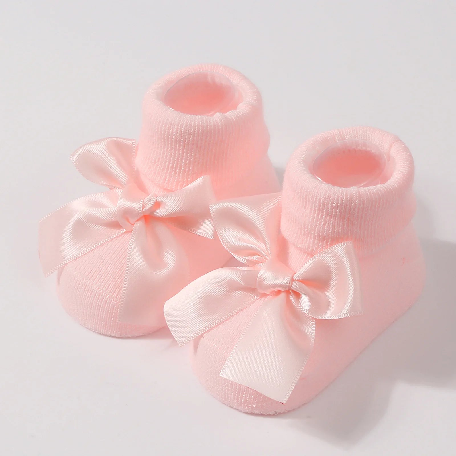 Chaussettes pour bébé en tricot avec nœud