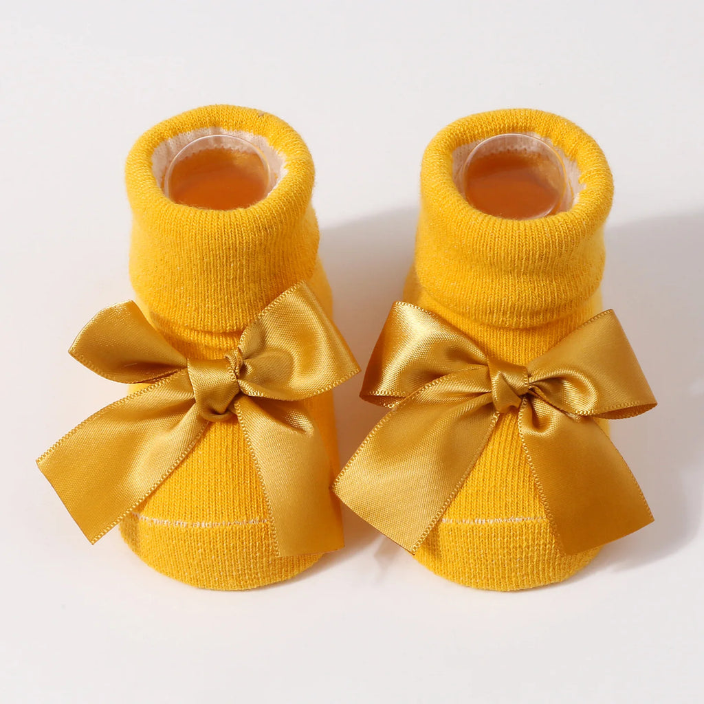 Chaussettes pour bébé en tricot avec nœud
