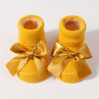 Chaussettes pour bébé en tricot avec nœud